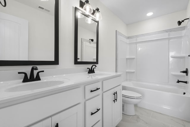 1 Shelton Ferry Rd, Southside, TN 37171 - full bathroom featuring toilet, double vanity, marble look tiles, and shower / tub combination