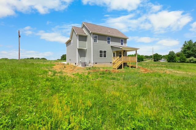 1 Shelton Ferry Rd, Southside, TN 37171 - back of house with cooling unit, crawl space, and stairs