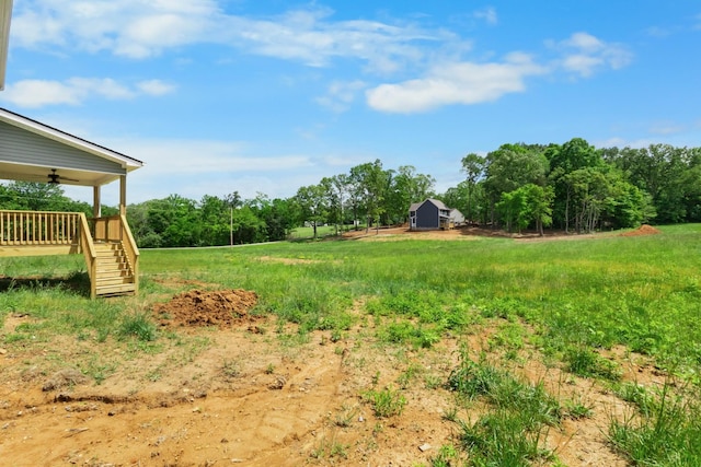 1 Shelton Ferry Rd, Southside, TN 37171 - view of yard with a ceiling fan and stairs