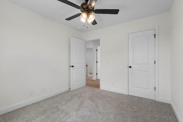 1 Shelton Ferry Rd, Southside, TN 37171 - unfurnished bedroom with carpet flooring, baseboards, and ceiling fan
