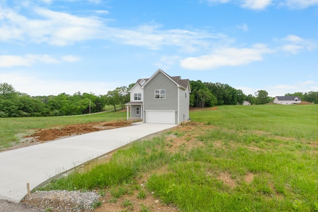 1 Shelton Ferry Rd, Southside, TN 37171 - view of home's exterior with an attached garage, driveway, and a lawn