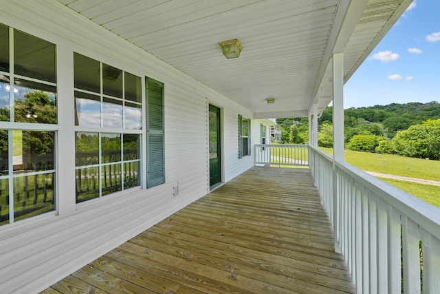 wooden terrace featuring a porch