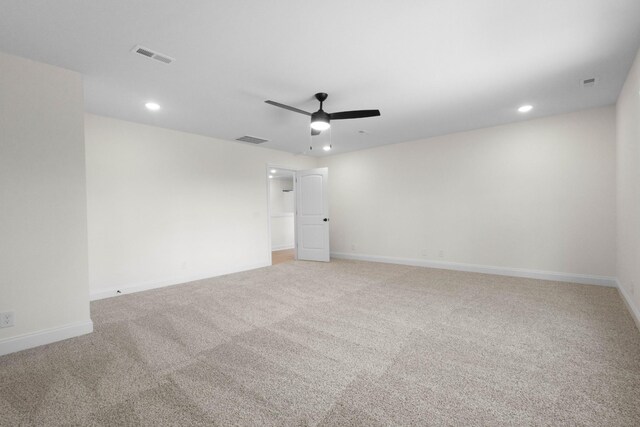 2214 S Hinton Rd, Southside, TN 37171 - spare room with light carpet, ceiling fan, recessed lighting, and baseboards