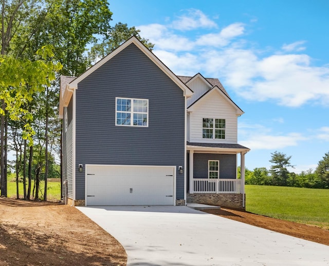 2214 S Hinton Rd, Southside, TN 37171 - traditional-style house with concrete driveway, a garage, a porch, and a front lawn