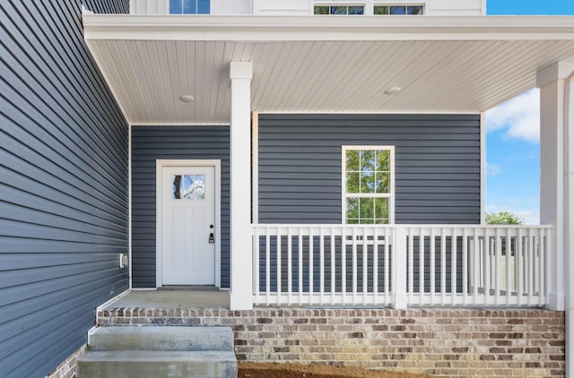 2214 S Hinton Rd, Southside, TN 37171 - view of exterior entry with a porch