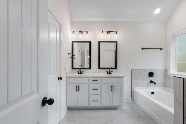 2214 S Hinton Rd, Southside, TN 37171 - bathroom with marble finish floors, a bath, double vanity, and baseboards