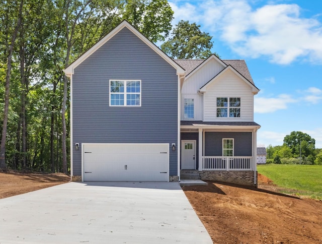 2214 S Hinton Rd, Southside, TN 37171 - traditional-style house with driveway, an attached garage, and a porch