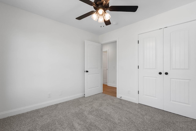 2214 S Hinton Rd, Southside, TN 37171 - unfurnished bedroom with carpet, baseboards, a closet, and ceiling fan