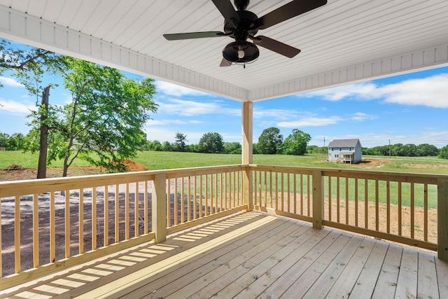 2214 S Hinton Rd, Southside, TN 37171 - wooden terrace with a ceiling fan, a view of countryside, and a yard