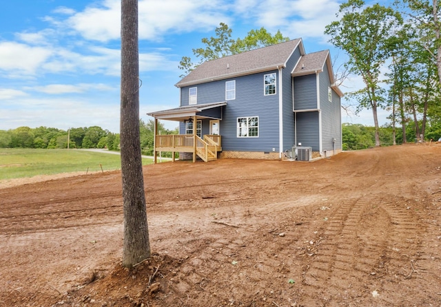 2214 S Hinton Rd, Southside, TN 37171 - back of property featuring cooling unit, covered porch, and stairway