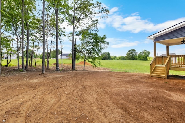 2214 S Hinton Rd, Southside, TN 37171 - view of grassy yard with stairway and a ceiling fan