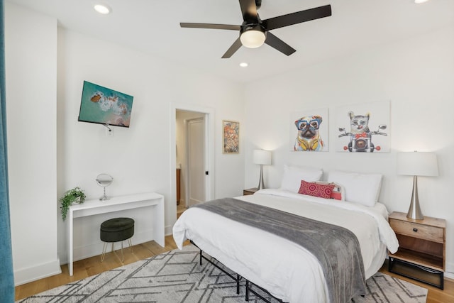 98 N 8th St, Nashville, TN 37206 - bedroom with wood finished floors, recessed lighting, ceiling fan, and baseboards