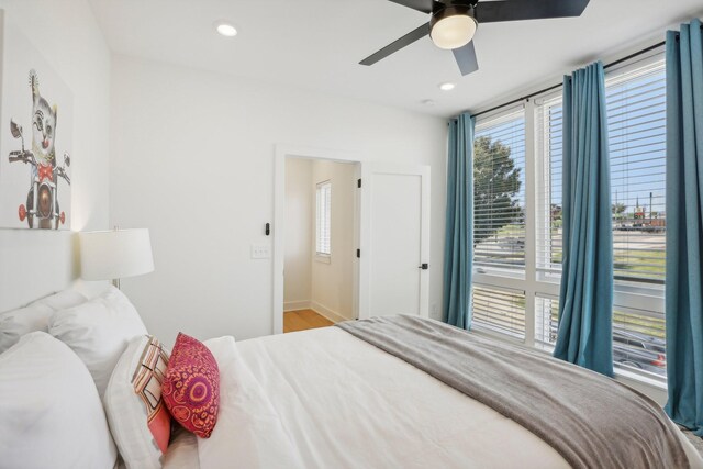 98 N 8th St, Nashville, TN 37206 - bedroom with recessed lighting, a ceiling fan, baseboards, and wood finished floors