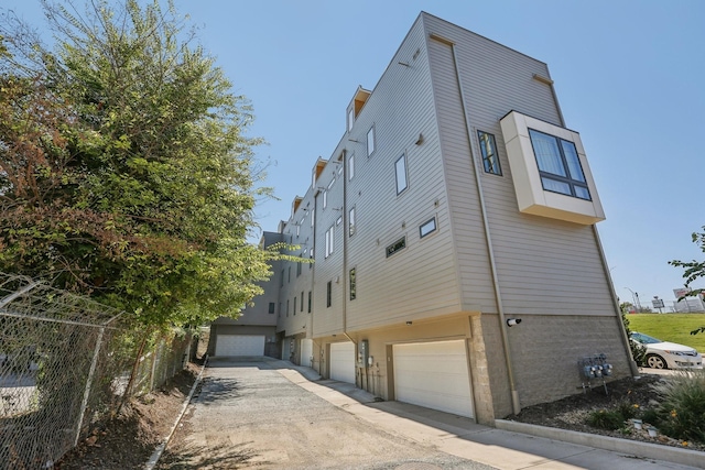 98 N 8th St, Nashville, TN 37206 - view of home's exterior featuring a garage
