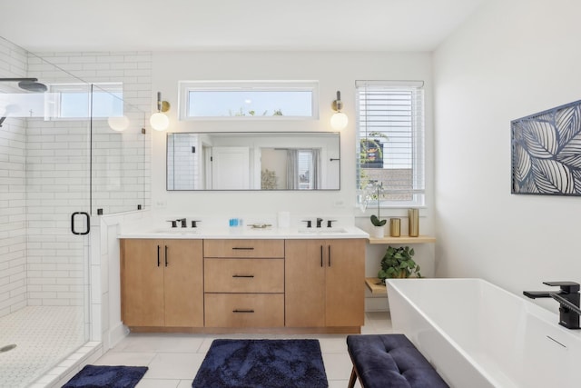 98 N 8th St, Nashville, TN 37206 - full bathroom with a shower stall, tile patterned floors, a soaking tub, and double vanity