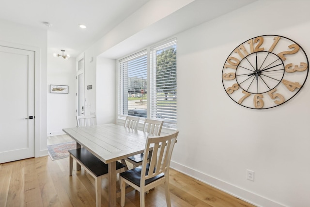 98 N 8th St, Nashville, TN 37206 - dining area featuring light wood-style floors, a chandelier, baseboards, and recessed lighting