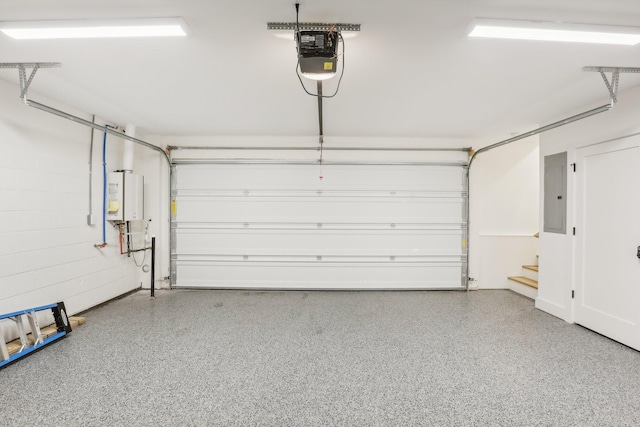 98 N 8th St, Nashville, TN 37206 - garage featuring a garage door opener and electric panel