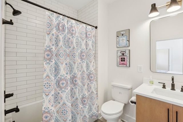 98 N 8th St, Nashville, TN 37206 - bathroom featuring toilet, vanity, and shower / bath combo with shower curtain