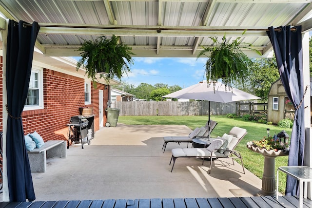 801 Lloyd St, Lawrenceburg, TN 38464 - wooden terrace featuring a patio area and an outbuilding