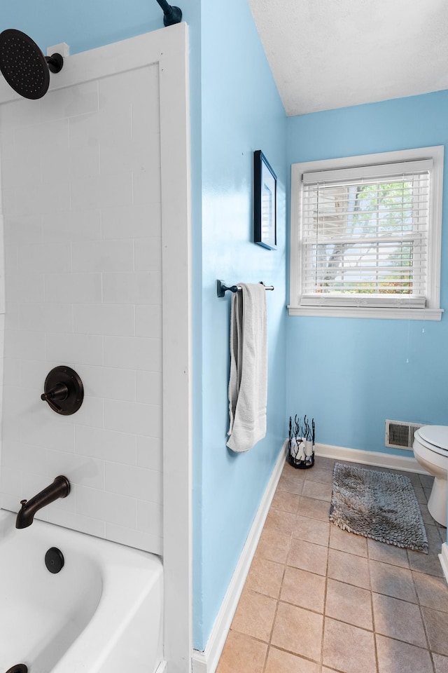 801 Lloyd St, Lawrenceburg, TN 38464 - bathroom featuring baseboards, shower / washtub combination, toilet, and tile patterned flooring