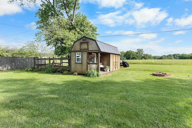 801 Lloyd St, Lawrenceburg, TN 38464 - view of outbuilding with an outdoor fire pit and an outbuilding