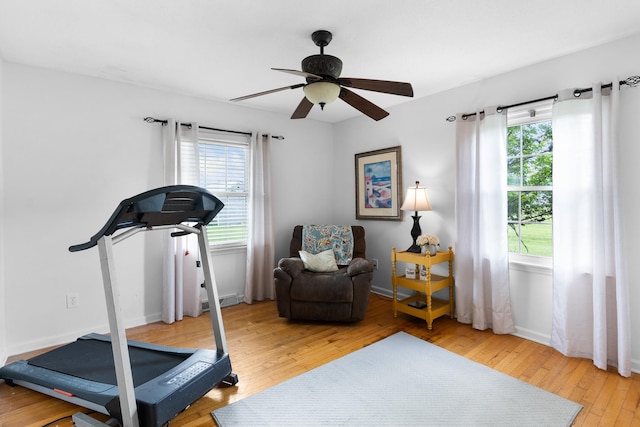 801 Lloyd St, Lawrenceburg, TN 38464 - workout room featuring wood-type flooring, a ceiling fan, and baseboards