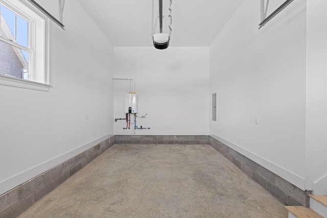 2208 Launcelot Rd, Chattanooga, TN 37421 - garage with a garage door opener and water heater