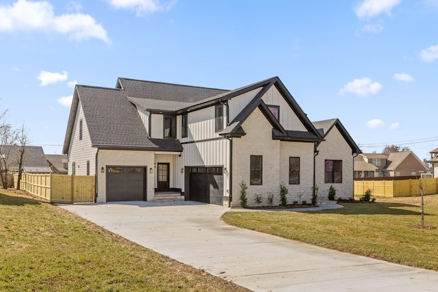 2208 Launcelot Rd, Chattanooga, TN 37421 - modern farmhouse with driveway, board and batten siding, a garage, and roof with shingles