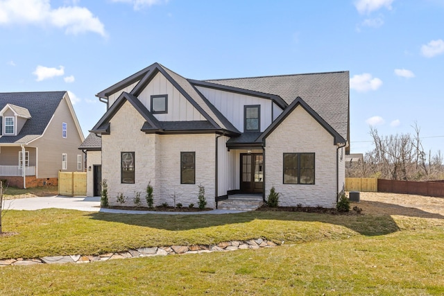 2208 Launcelot Rd, Chattanooga, TN 37421 - view of front of home featuring board and batten siding and stone siding