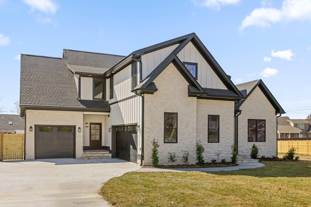 2208 Launcelot Rd, Chattanooga, TN 37421 - modern farmhouse style home with stone siding, concrete driveway, roof with shingles, and board and batten siding