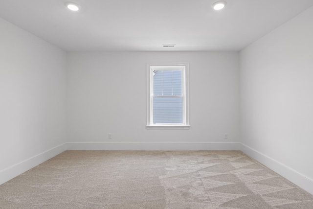 2208 Launcelot Rd, Chattanooga, TN 37421 - spare room featuring light colored carpet, baseboards, and recessed lighting