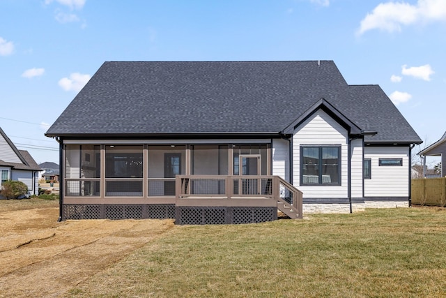 2208 Launcelot Rd, Chattanooga, TN 37421 - back of house featuring a sunroom, roof with shingles, and a lawn