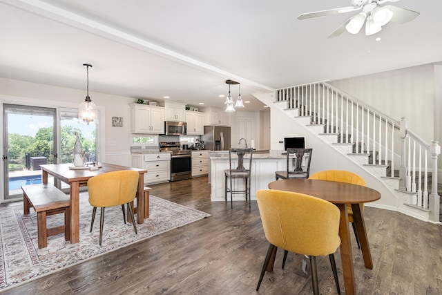 500 Mark Green Ct, Spring Hill, TN 37174 - dining area with stairs, dark wood-style flooring, ceiling fan, and recessed lighting