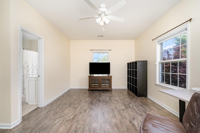 500 Mark Green Ct, Spring Hill, TN 37174 - unfurnished living room with wood finished floors, ceiling fan, and baseboards