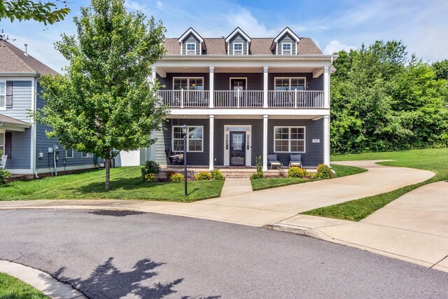 160 Majestic Ln, Pleasant View, TN 37146 - view of front of home with a balcony, a porch, and a front yard