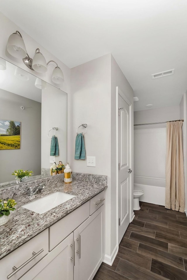 160 Majestic Ln, Pleasant View, TN 37146 - full bathroom with vanity, wood finish floors, toilet, and baseboards
