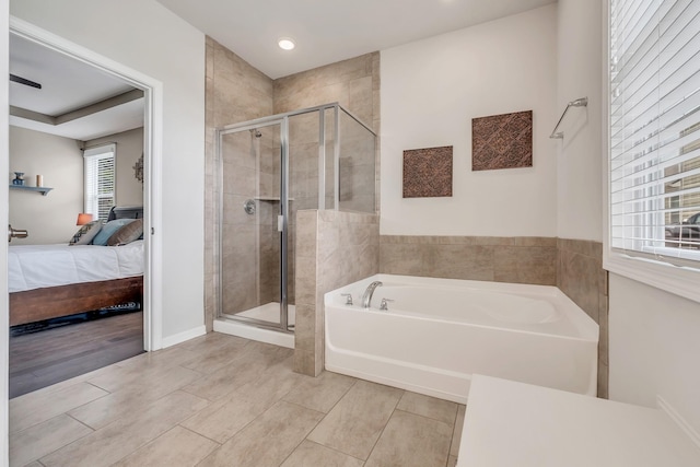 160 Majestic Ln, Pleasant View, TN 37146 - full bath featuring ensuite bathroom, a shower stall, a bath, tile patterned flooring, and recessed lighting