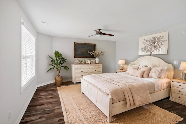 160 Majestic Ln, Pleasant View, TN 37146 - bedroom featuring dark wood-type flooring, multiple windows, baseboards, and a ceiling fan