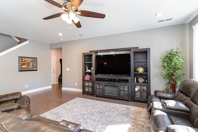3308 Longstalk Rd, Antioch, TN 37013 - living room featuring wood finished floors, ceiling fan, baseboards, and a fireplace