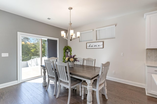 3308 Longstalk Rd, Antioch, TN 37013 - dining room with a chandelier, baseboards, and dark wood finished floors