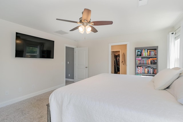 3308 Longstalk Rd, Antioch, TN 37013 - bedroom with carpet floors, baseboards, a spacious closet, and a ceiling fan