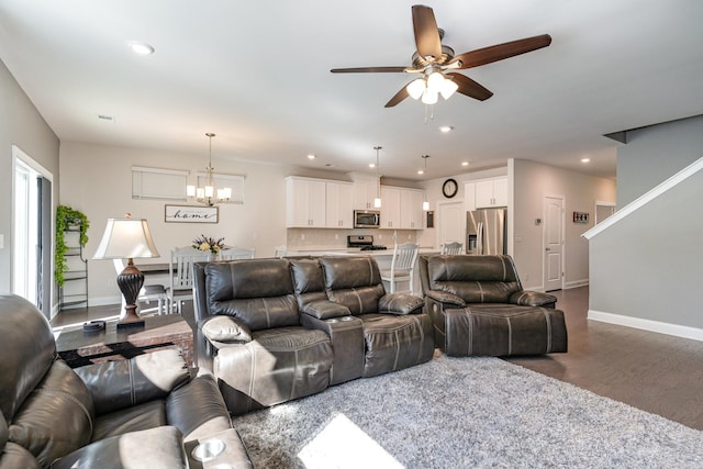 3308 Longstalk Rd, Antioch, TN 37013 - living area with a chandelier, ceiling fan, wood finished floors, baseboards, and recessed lighting