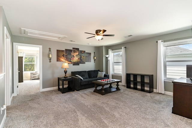 3308 Longstalk Rd, Antioch, TN 37013 - carpeted living area featuring attic access, a ceiling fan, and baseboards