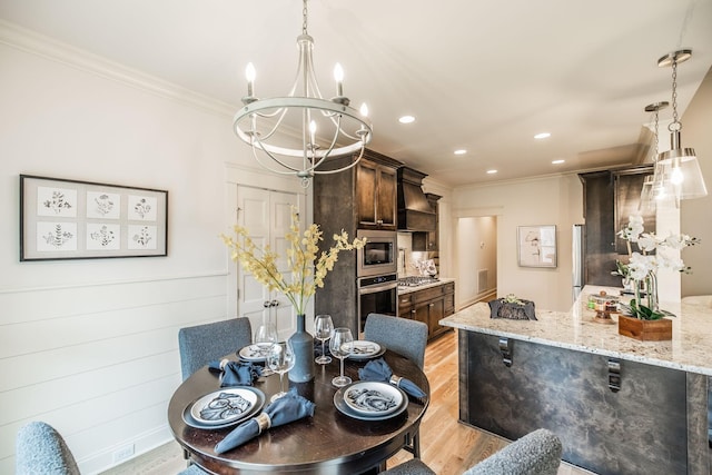 1219 Ben Forkum Dr, Lebanon, TN 37087 - dining room with a chandelier, ornamental molding, recessed lighting, and light wood-style floors
