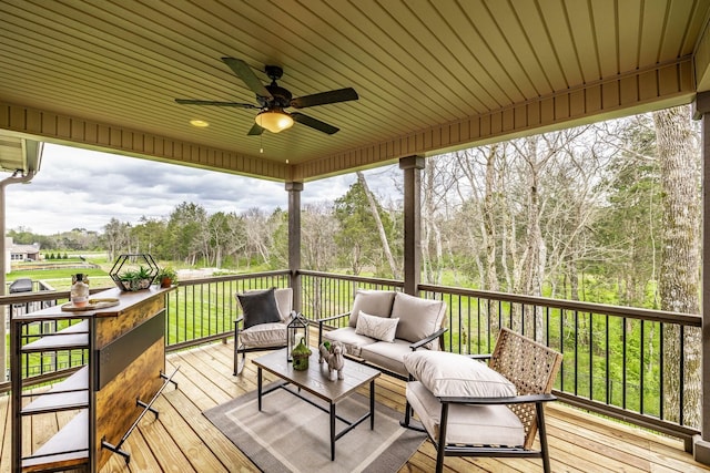 1219 Ben Forkum Dr, Lebanon, TN 37087 - wooden terrace featuring outdoor lounge area, a ceiling fan, and view of wooded area