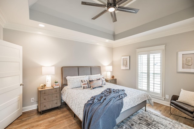1219 Ben Forkum Dr, Lebanon, TN 37087 - bedroom featuring light wood-type flooring, crown molding, baseboards, recessed lighting, and a tray ceiling