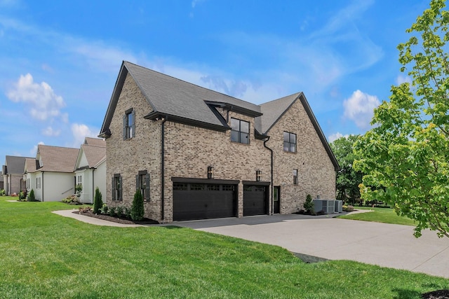 848 Brook Trl, Lebanon, TN 37087 - view of side of home featuring driveway, an attached garage, brick siding, a yard, and central AC unit