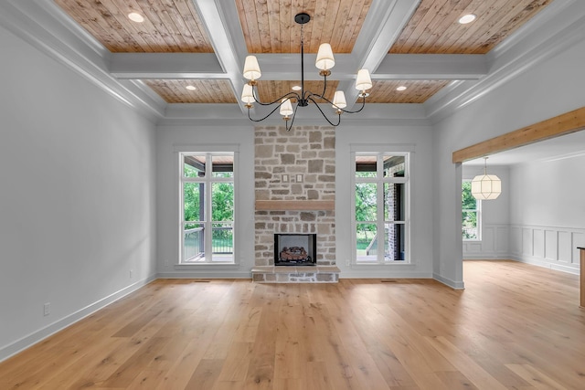 848 Brook Trl, Lebanon, TN 37087 - unfurnished living room featuring a chandelier, beam ceiling, plenty of natural light, hardwood / wood-style floors, and coffered ceiling