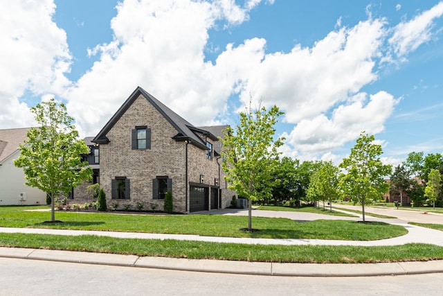 848 Brook Trl, Lebanon, TN 37087 - view of side of home featuring a garage, concrete driveway, a yard, and brick siding