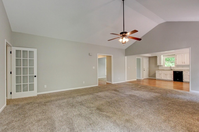 1420 E Rhett Butler Rd, Clarksville, TN 37042 - unfurnished living room featuring light colored carpet, a sink, ceiling fan, baseboards, and high vaulted ceiling